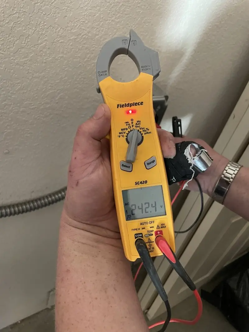 Voltage testing with clamp meter during Electrical Installation Services in Moses Lake